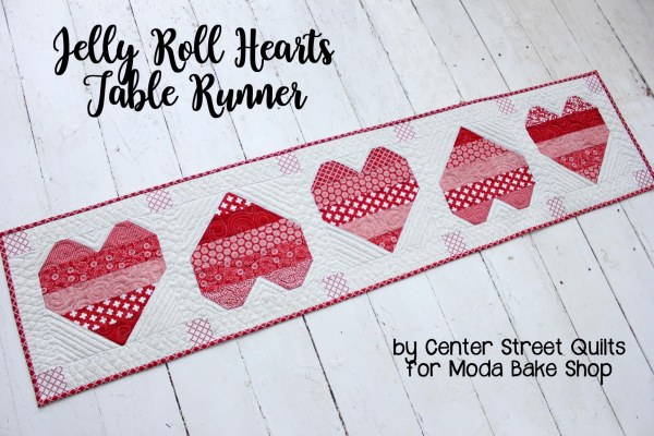 "Jelly Roll Hearts" is a Free Valentine's Day Quilted Table Runner Pattern designed by Kristina Brinkerhoff from Center Street Quilts!
